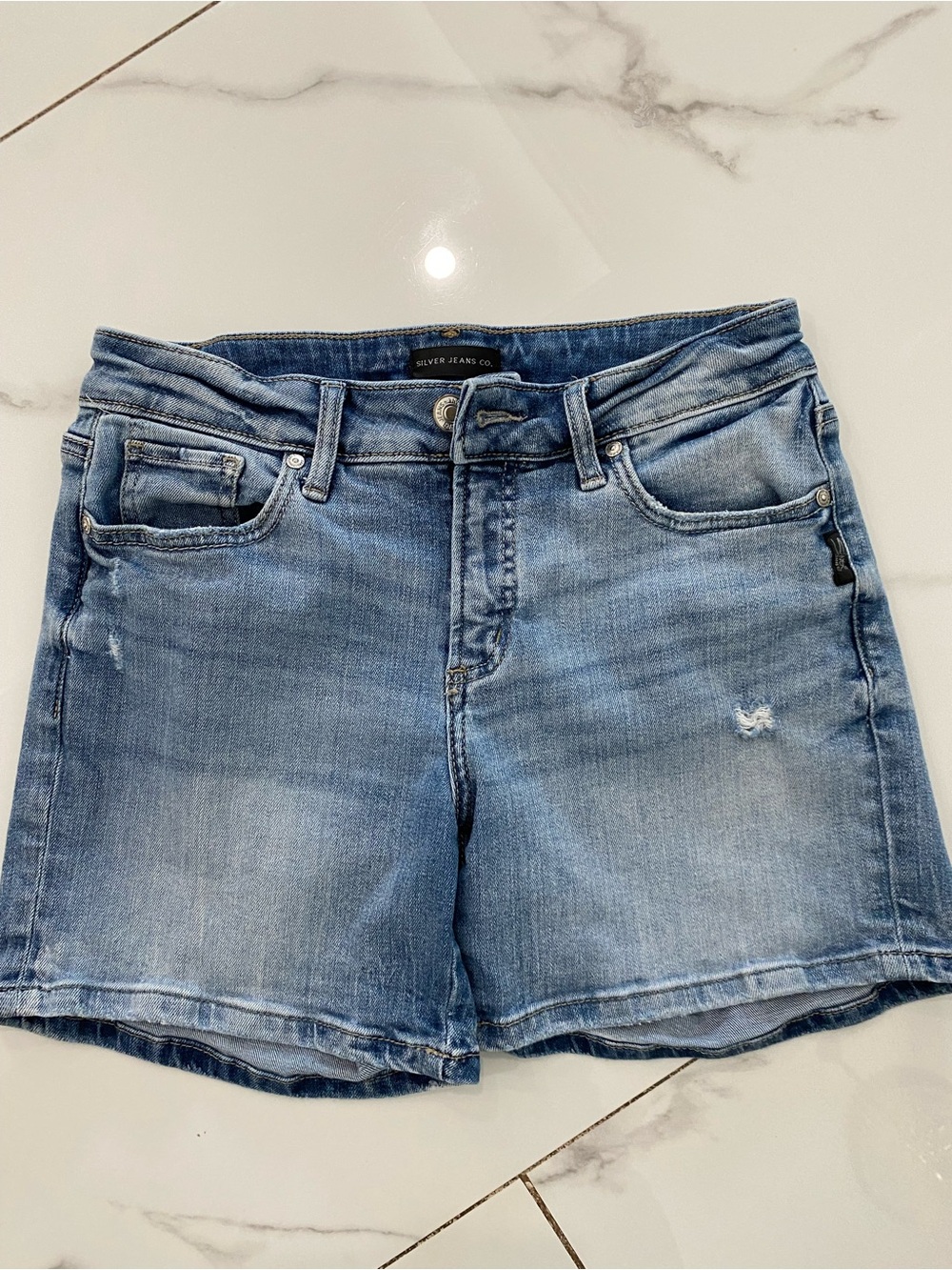 Women’s Silver Jeans Light Blue Distressed Denim Shorts